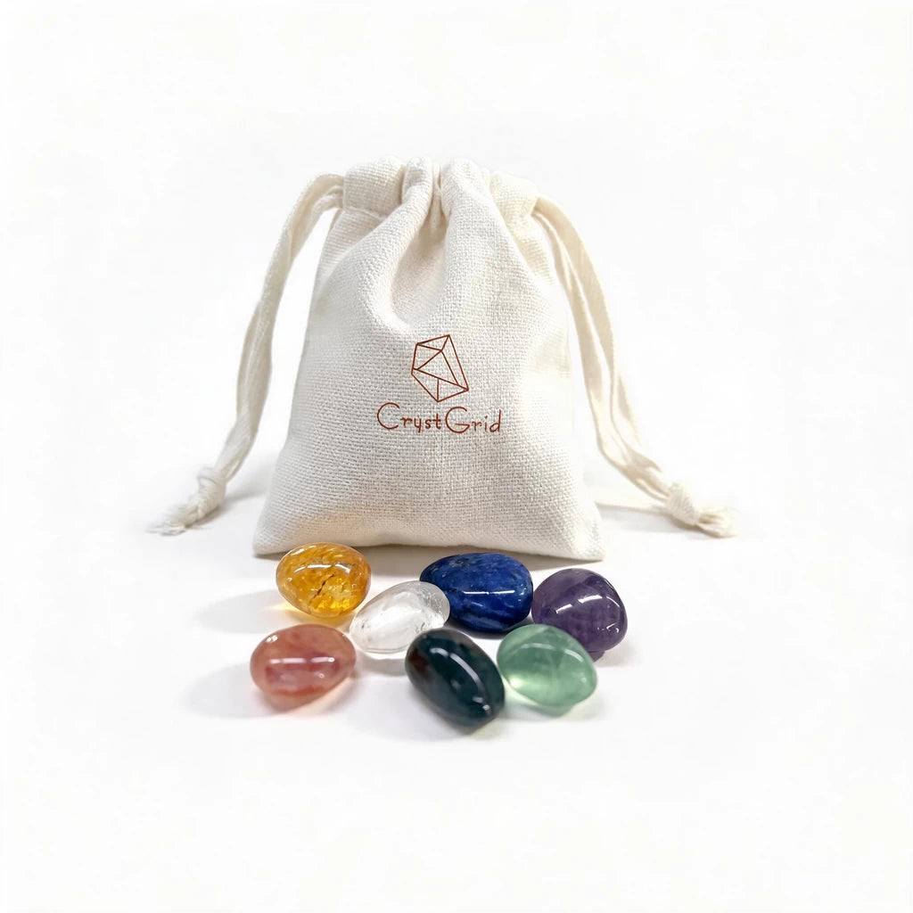 CrystGrid linen pouch with seven chakra stones in red, yellow, clear, blue, green, black and purple