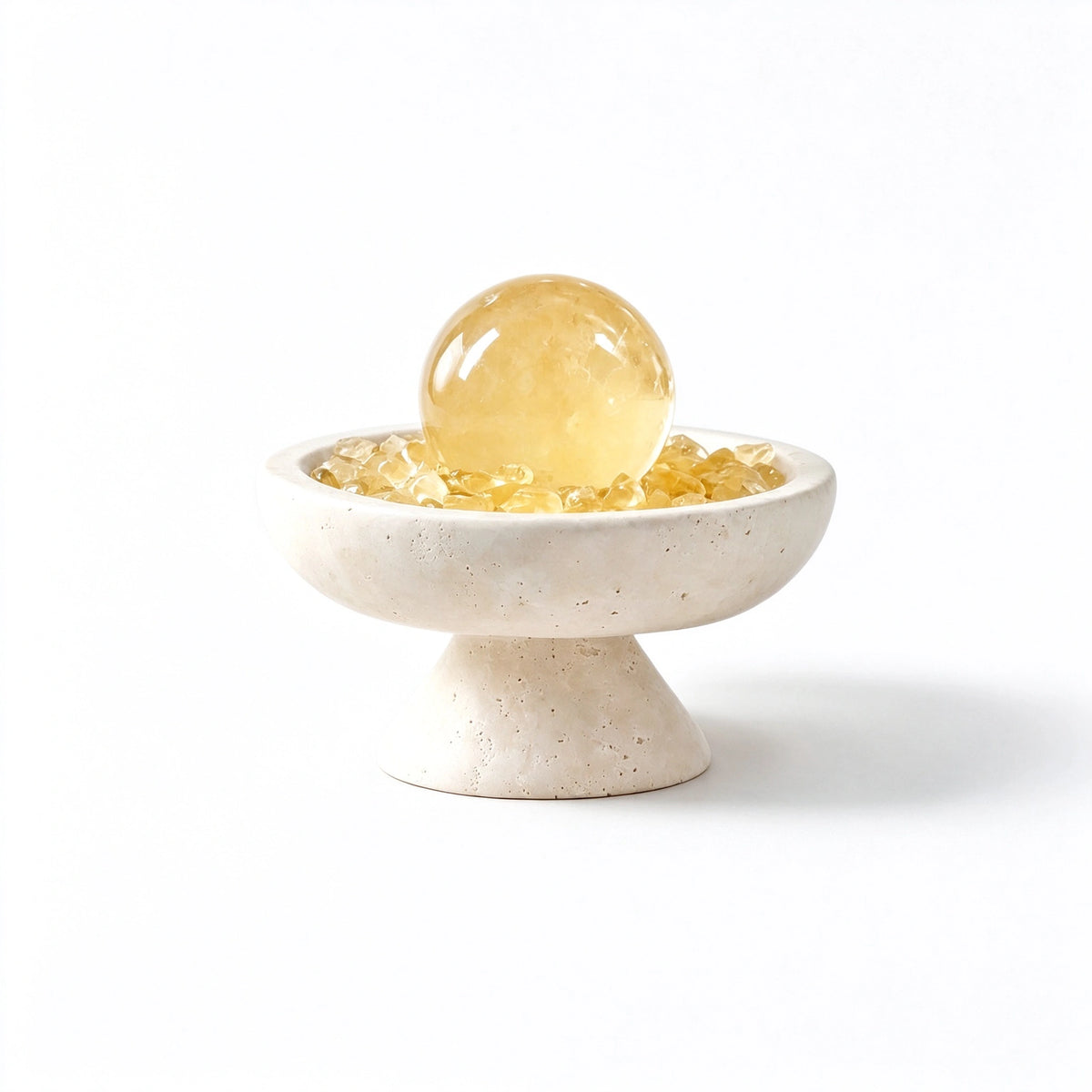 Citrine crystal radiance plinth vessel with natural crystal pieces on a travertine base