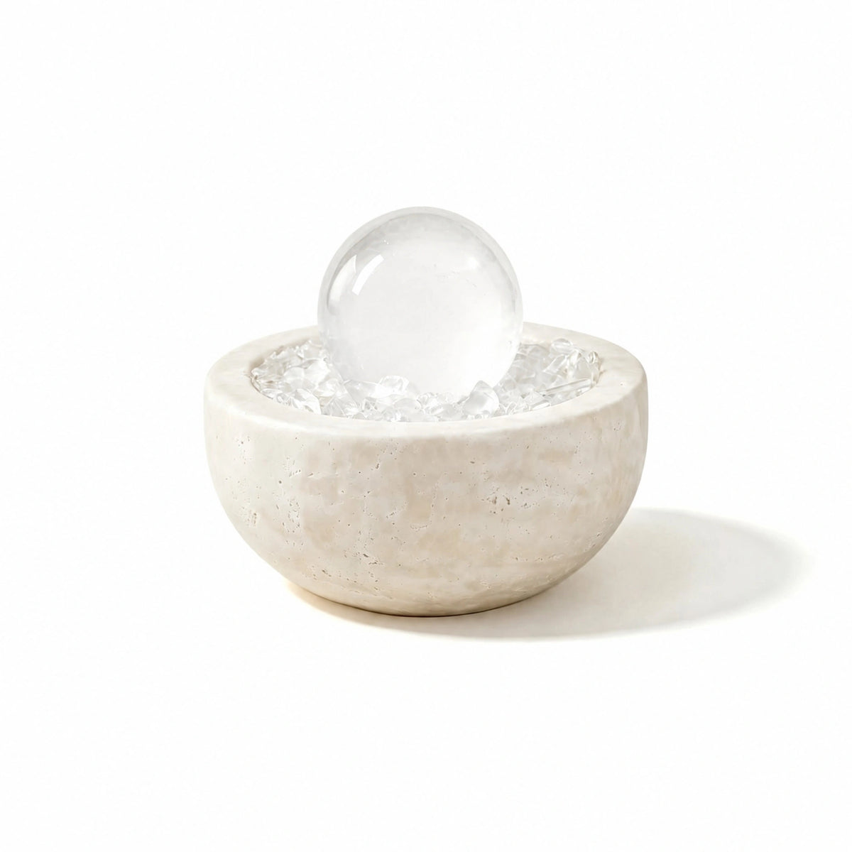 Clear Radiance Treasure Basin crystal vessel in a natural stone basin with crystal points