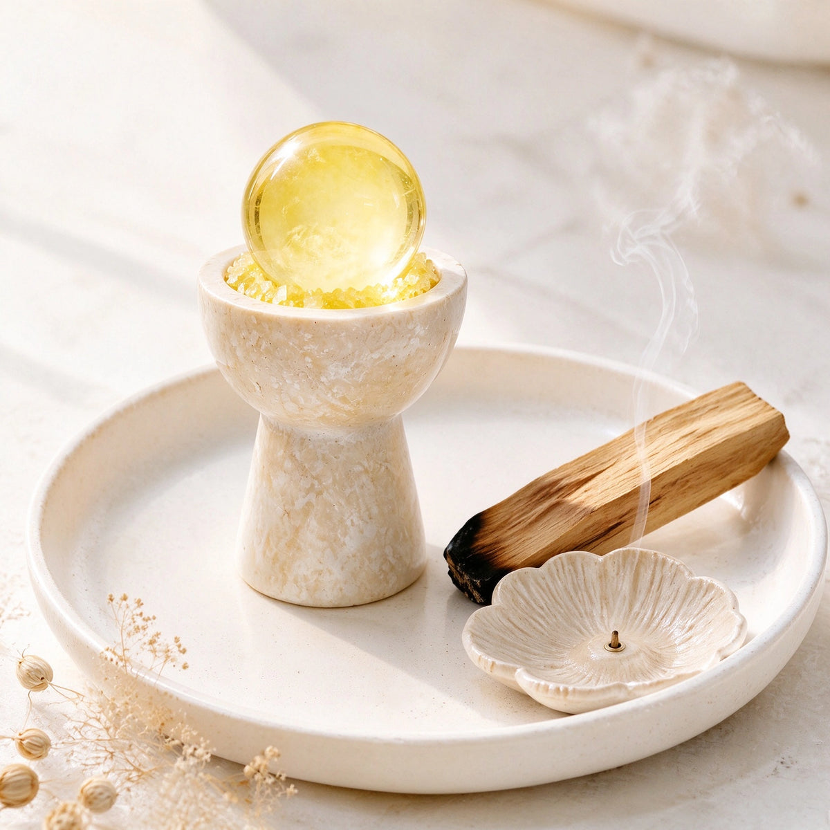 Close-up of the citrine crystal sphere chalice with natural stones and travertine details