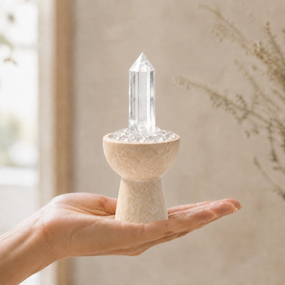 White crystal altar decor with a travertine chalice vessel