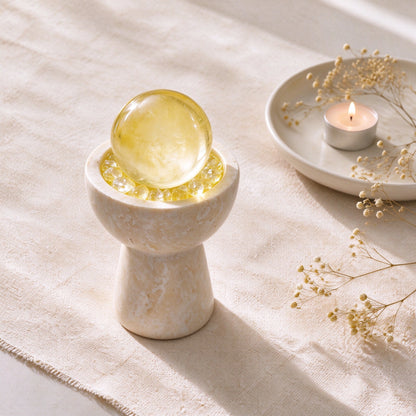 Citrine crystal altar decor with a travertine sphere chalice vessel